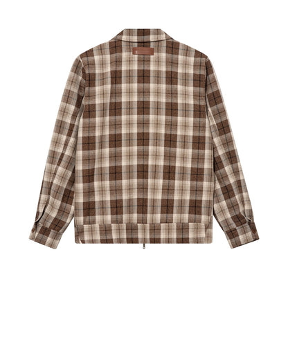 Flat lay of the MOS MOSH Gallery Canada Trossard Jacket in toffee check, back view, showing the leather-look patch and banded hem on a white background.
