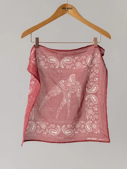 MOS MOSH Gallery Canada Martin paisley neckerchief in red with a white bird motif and paisley border, hanging from a wooden hanger against a grey background.