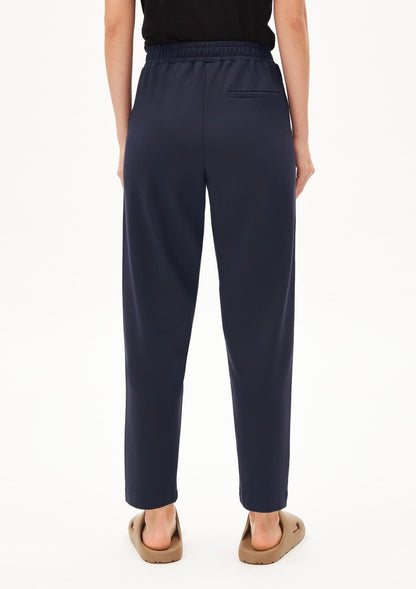 ARMEDANGELS Canada Magdaalena Jersey Pants navy blue pants with elastic waistband and back pocket shown from the rear