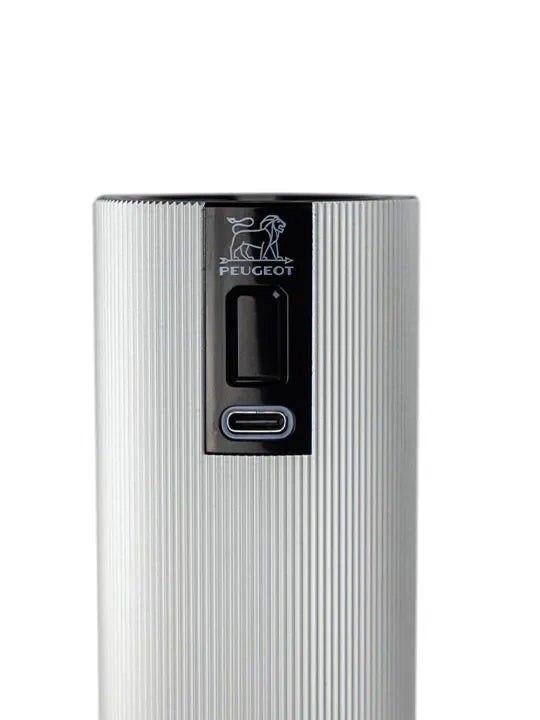 Closup up of Peugeot Line electric salt mill in aluminum, on a white background
