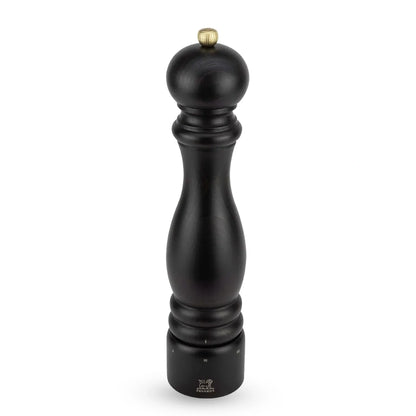 A tall black salt mill with a polished brass top knob and a silver-toned base dial, shown on a clean white background.