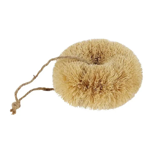 Natural fiber scrubber with a string on a white background