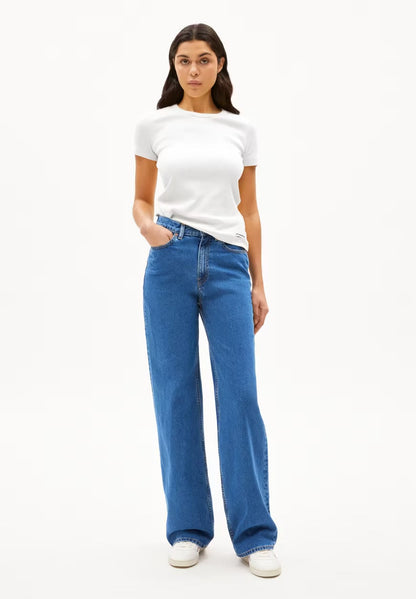 ARMEDANGELS  Canadawhite short sleeve tribbed t-shirt paired with blue wide leg jeans and white sneakers