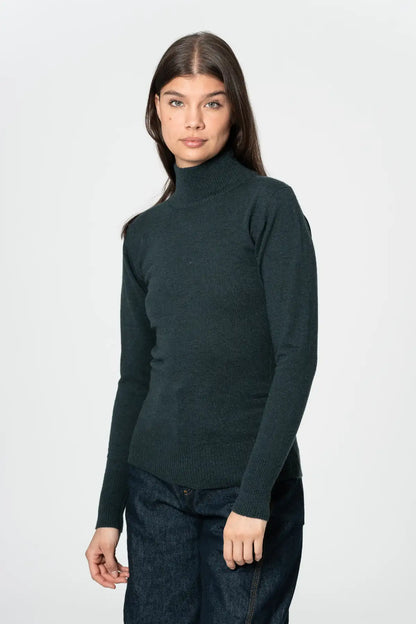 Dinadi women's merino turtleneck in dark green, perfect for cozy fall layering