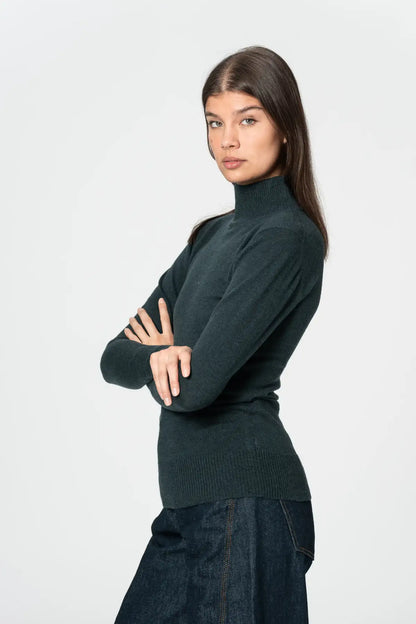 Dinadi women's merino turtleneck sweater in dark green, perfect for stylish layering and warmth